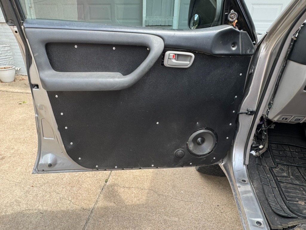 Front door panel with Alpine 6.5 inch component speaker already installed, stripped and refinished panel