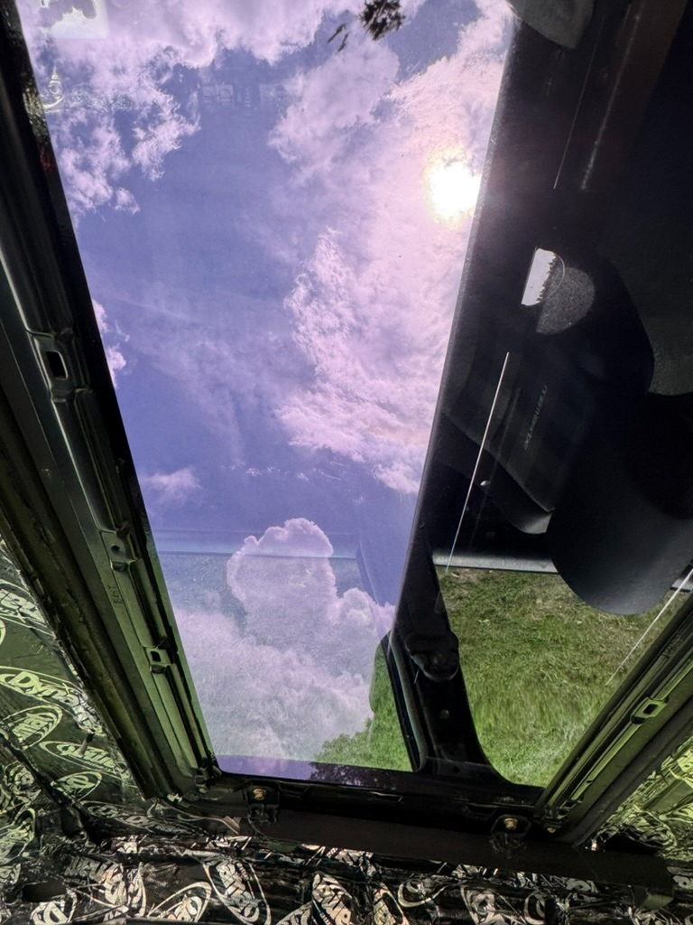 Dynamat installed in the sunroof headliner area