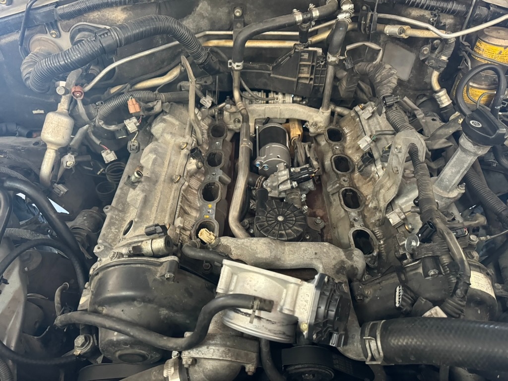 2UZ-FE V8 with valve covers visible during service