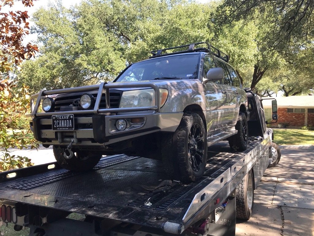 Land Cruiser on a flatbed during transport phase