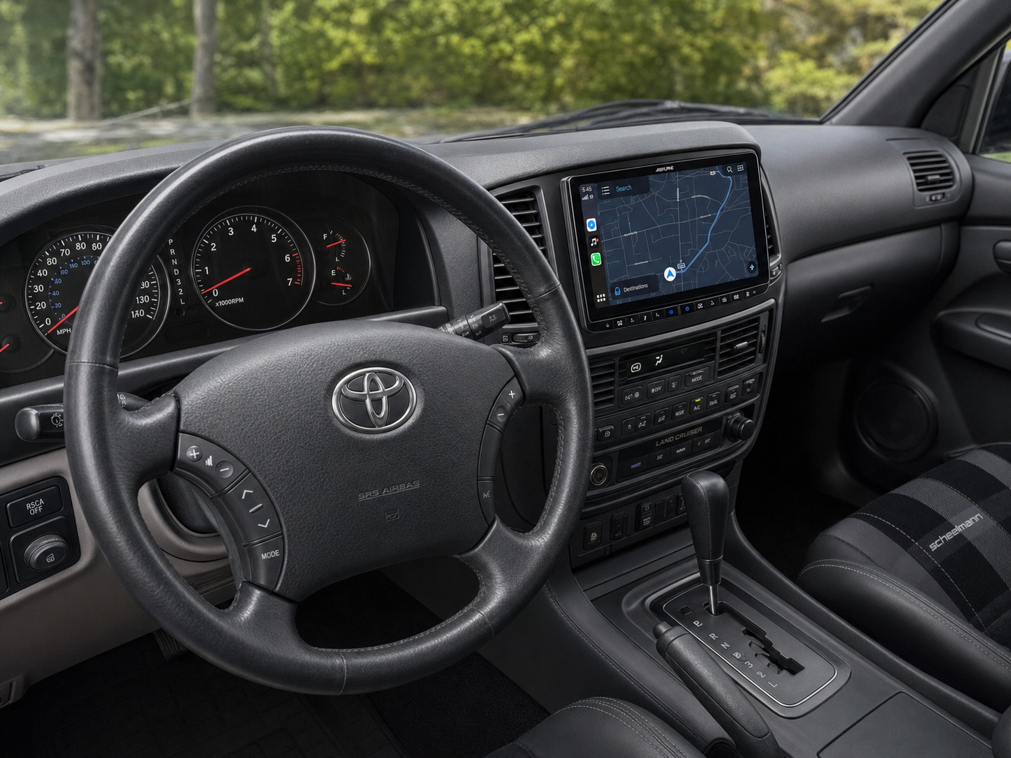 Dashboard with Alpine 8-inch LCD flush-integrated, factory climate controls restored, clean modern look